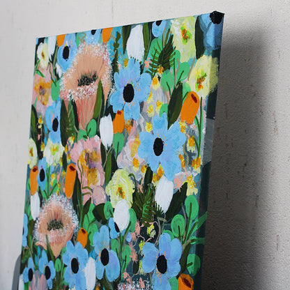 Lateral view of colorful floral painting on a textured wall
