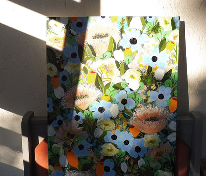 view of the painting with summer blooms in the light of the sunset